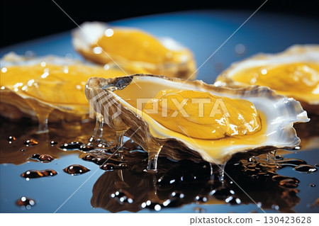 Freshly Shucked Oysters with Zesty Lemon, Perfectly Prepared and Ready for Delectable Consumption Freshly Shucked Oysters with Zesty Lemon, Perfectly Prepared and Ready for Delectable Consumption 130423628