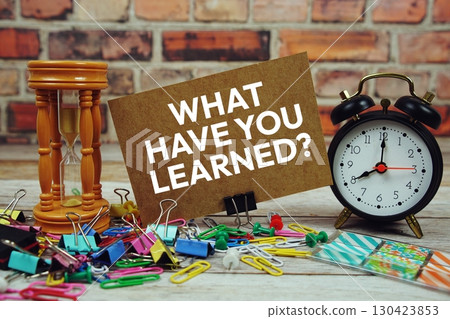 What have you Learned? text on paper card with alarm clock and stationary on wooden background What have you Learned? text on paper card with alarm clock and stationary on wooden background 130423853