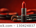Bold Red Lipstick and Brushes 130424837
