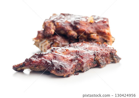 Pork BBQ glazed ribs isolated on white background. Pork BBQ glazed ribs isolated on white background. 130424956