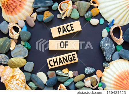 Pace of change symbol. Concept words Pace of change on beautiful wooden blocks. Beautiful black background. Sea shells and sea stones. Business pace of change concept. Copy space. Pace of change symbol. Concept words Pace of change on beautiful wooden blocks. Beautiful black background. Sea shells and sea stones. Business pace of change concept. Copy space. 130425823