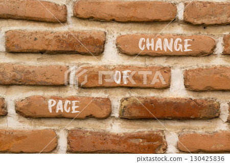 Pace of change symbol. Concept words Pace of change on beautiful brown brick wall. Beautiful brown brick wall background. Business pace of change concept. Copy space. Pace of change symbol. Concept words Pace of change on beautiful brown brick wall. Beautiful brown brick wall background. Business pace of change concept. Copy space. 130425836
