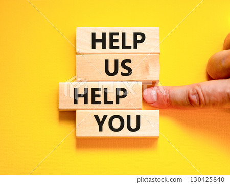 Help you symbol. Concept words phrase Help us help you on beautiful wooden blocks. Beautiful yellow paper background. Businessman's hand. Business Help you concept. Copy space. Help you symbol. Concept words phrase Help us help you on beautiful wooden blocks. Beautiful yellow paper background. Businessman's hand. Business Help you concept. Copy space. 130425840
