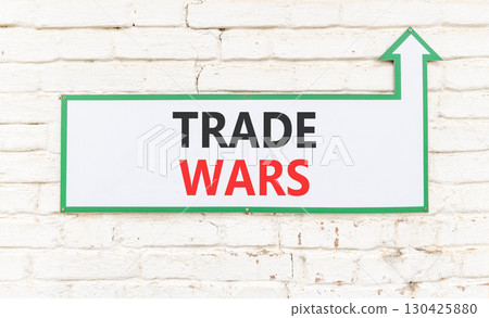 Trade wars symbol. Concept word Trade wars on beautiful white sign on white brick wall. Beautiful white brick wall background. Business trade wars concept. Copy space. Trade wars symbol. Concept word Trade wars on beautiful white sign on white brick wall. Beautiful white brick wall background. Business trade wars concept. Copy space. 130425880