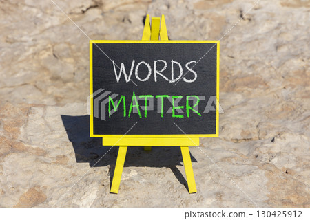 Words matter symbol. Concept word Words matter on beautiful black blackboard. Beautiful stone background. Black blackboard. Business words matter concept. Copy space. Words matter symbol. Concept word Words matter on beautiful black blackboard. Beautiful stone background. Black blackboard. Business words matter concept. Copy space. 130425912