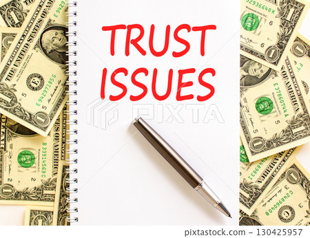 Trust issues symbol. Concept word Trust issues on beautiful white note. Dollar bills. Beautiful dollar bills background. Black pen. Business trust issues concept. Copy space. Trust issues symbol. Concept word Trust issues on beautiful white note. Dollar bills. Beautiful dollar bills background. Black pen. Business trust issues concept. Copy space. 130425957