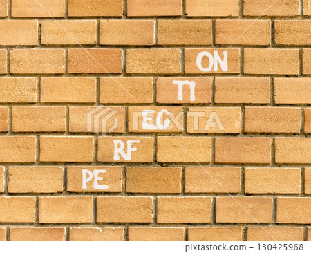 Perfection symbol. Concept word Perfection on beautiful brown bricks. Beautiful brown brick wall background. Business perfection concept. Copy space. Perfection symbol. Concept word Perfection on beautiful brown bricks. Beautiful brown brick wall background. Business perfection concept. Copy space. 130425968