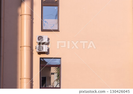 air conditioners are mounted on the wall. technologies for air cooling in hot weather. air conditioners are mounted on the wall. technologies for air cooling in hot weather. 130426045