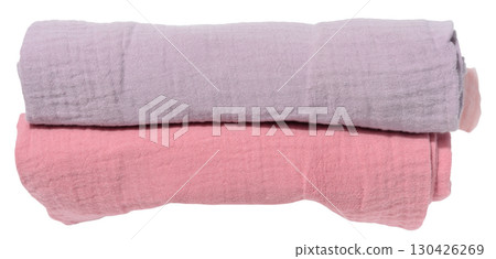 Stack of folded cotton towels in pastel shades on isolated background. 130426269