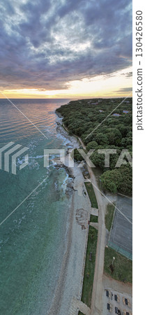 Aerial drone sunset vertical panorama of Lanterna peninsula, Istria, Croatia. 130426580
