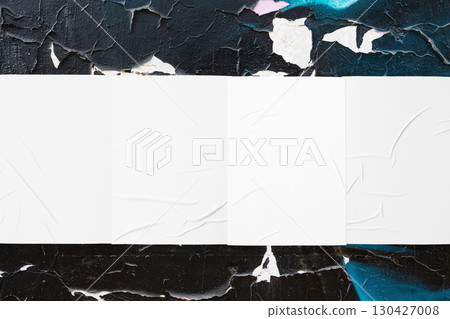 colorful urban wall with four wrinkled glued poster templates 130427008