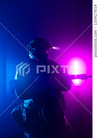 Tactical Soldier in Action Helmet On Off Dramatic Lights Smoke 130427614