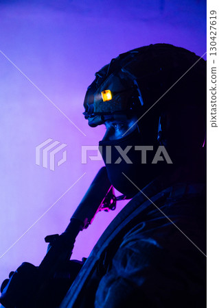 Tactical Soldier in Action Helmet On Off Dramatic Lights Smoke Tactical Soldier in Action Helmet On Off Dramatic Lights Smoke 130427619