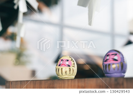 Colorful mini Daruma dolls in Takasaki 130429543