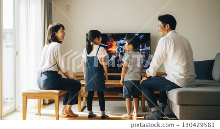 Family time watching TV Family time watching TV 130429581