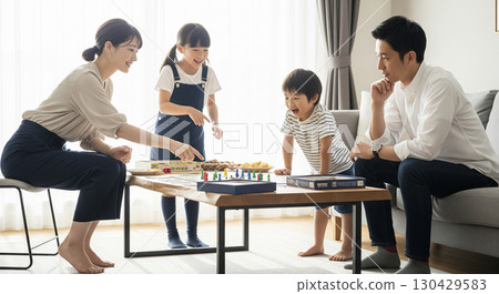 Family time playing board games 130429583