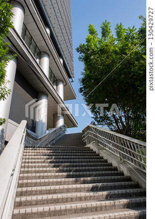 A refreshing view of an office district with lots of greenery 130429727