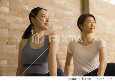 A woman who plays hot yoga 130430296