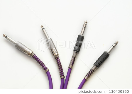 Purple cables jacks.Connection electric guitar,amplifier,mixer,sound equipment 130430560