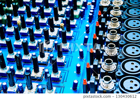 Disassembled music mixer console with inputs for repair, maintenance 130430612