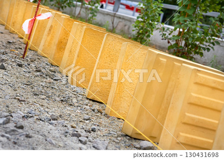 Construction road works.Laying pedestrian tiles with relief for the blind 130431698