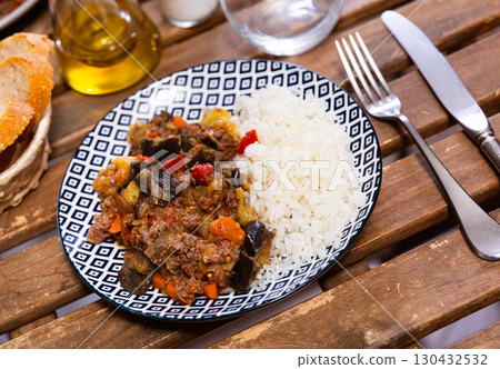 Stewed eggplants served with minced meat 130432532