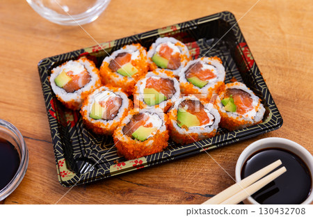 California roll masago caviar with cheese avocado and salmon California roll masago caviar with cheese avocado and salmon 130432708