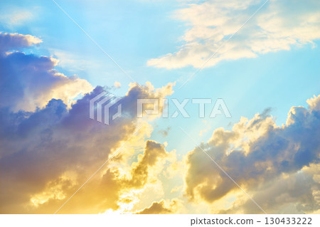 Peaceful sunny sky.Clouds in the sunset light Peaceful sunny sky.Clouds in the sunset light 130433222