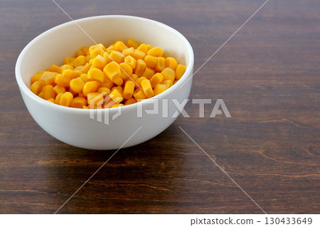 Corn kernels on the table background 130433649