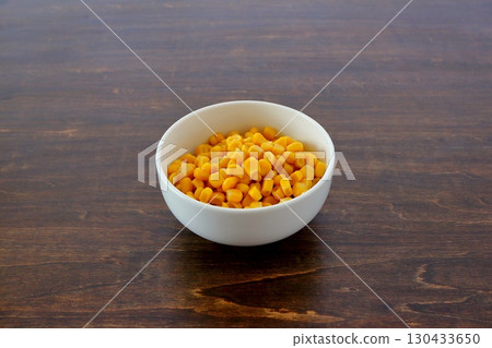 Corn kernels on the table background 130433650