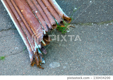 Rusty old water tube pipe,rusty.A pile of scrap iron 130434200