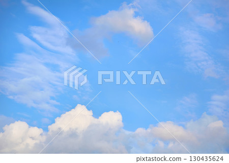 White clouds on light bright blue peaceful sky 130435624