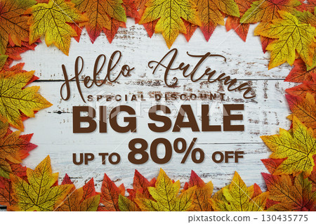 Hello Autumn Big Sale 80% with maple leaf decortaed on wooden background 130435775