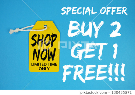 Buy 2 Get 1 Free!!! special offer with pric tag on blue background 130435871