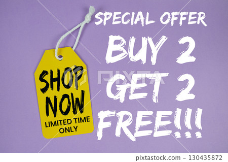 Buy 2 Get 2 Free!!! text with pric tag on purple background 130435872