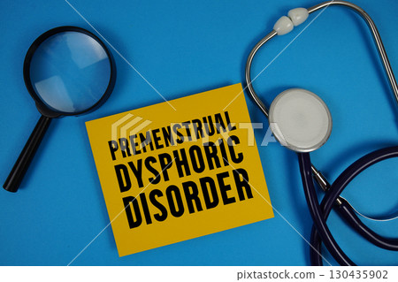 Premenstrual Dysphoric Disorder (PDD) text with Stethoscope and magnifying glass on blue background Premenstrual Dysphoric Disorder (PDD) text with Stethoscope and magnifying glass on blue background 130435902