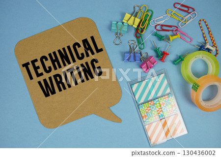 Technical Writing text with stationery on blue background 130436002
