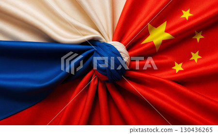 flags of russia and china tied in a knot and lying next to each other, peace concept 130436265