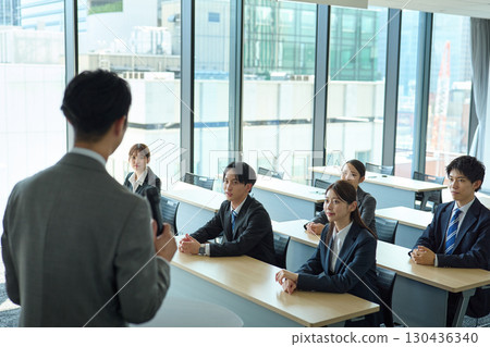 People listening to the explanation 130436340