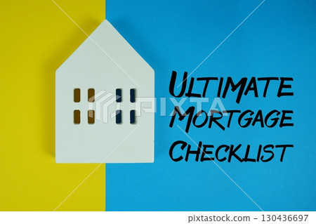 Ultimate Mortgage Checklist text with house models on blue background Ultimate Mortgage Checklist text with house models on blue background 130436697