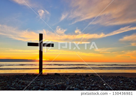 Stoney Beach Cross Sunset 130436981