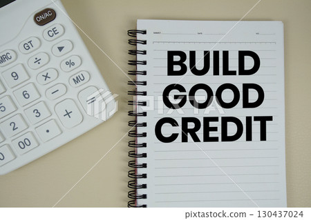 Build Good Credit text with calculator phrase of business and financial concept 130437024