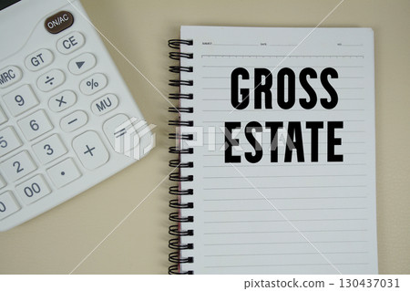 Gross Estate text with calculator phrase of business and financial concept Gross Estate text with calculator phrase of business and financial concept 130437031