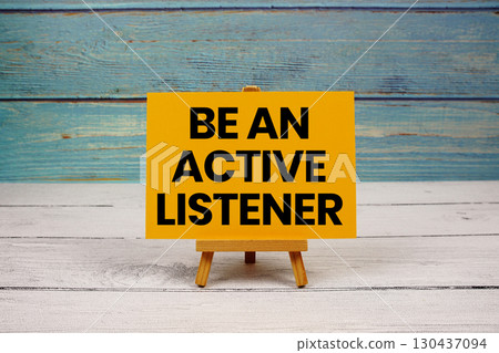 Be An Active Listener text written on paper card on wooden background Be An Active Listener text written on paper card on wooden background 130437094