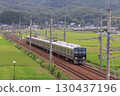 207 series train running near Mita on the Fukuchiyama Line 130437196