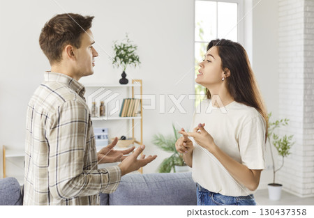 Close-up of a couple quarreling in the living room 130437358