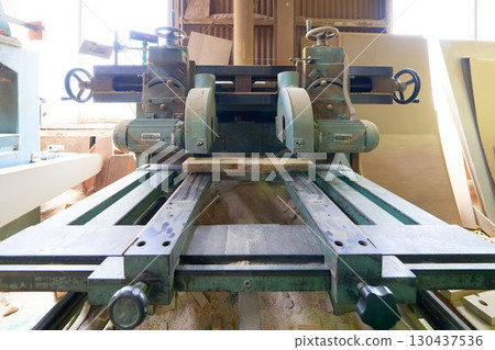 Machine tools installed in a woodworking shop 130437536
