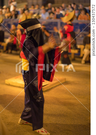 Young women dancing in indigo-dyed yukatas with Hikozono hoods at the Nishimonai Bon Odori Festival 2025 in Akita Prefecture Young women dancing in indigo-dyed yukatas with Hikozono hoods at the Nishimonai Bon Odori Festival 2025 in Akita Prefecture 130437572