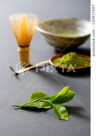 Making matcha. Image of matcha on a black background. 130437687