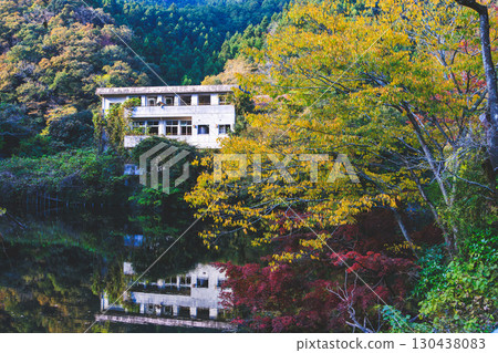 Lake Kamokita and ruins during autumn foliage season 130438083